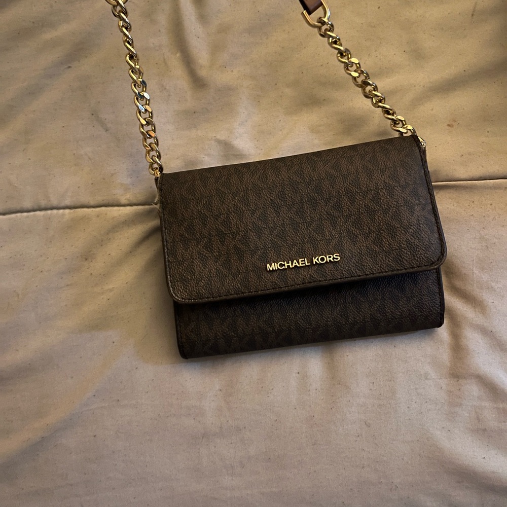 PRE OWNED MICHEAL KORS BAG.